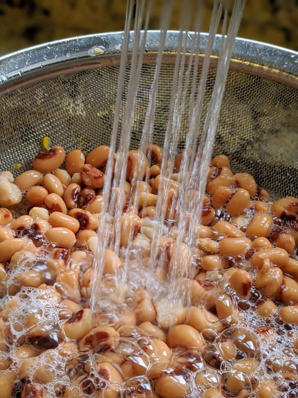 rinsing off the beans