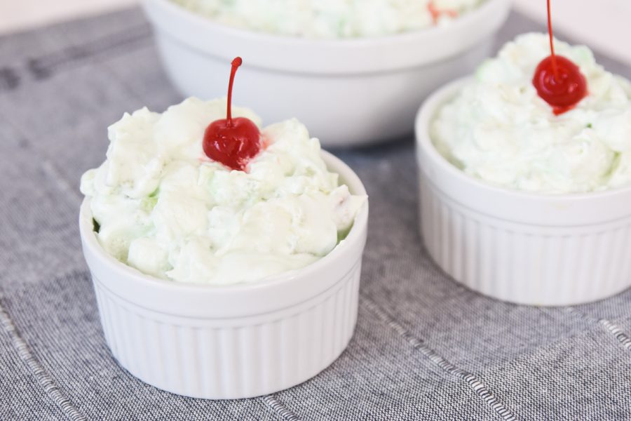 Single serving of Watergate Salad with cherry. 