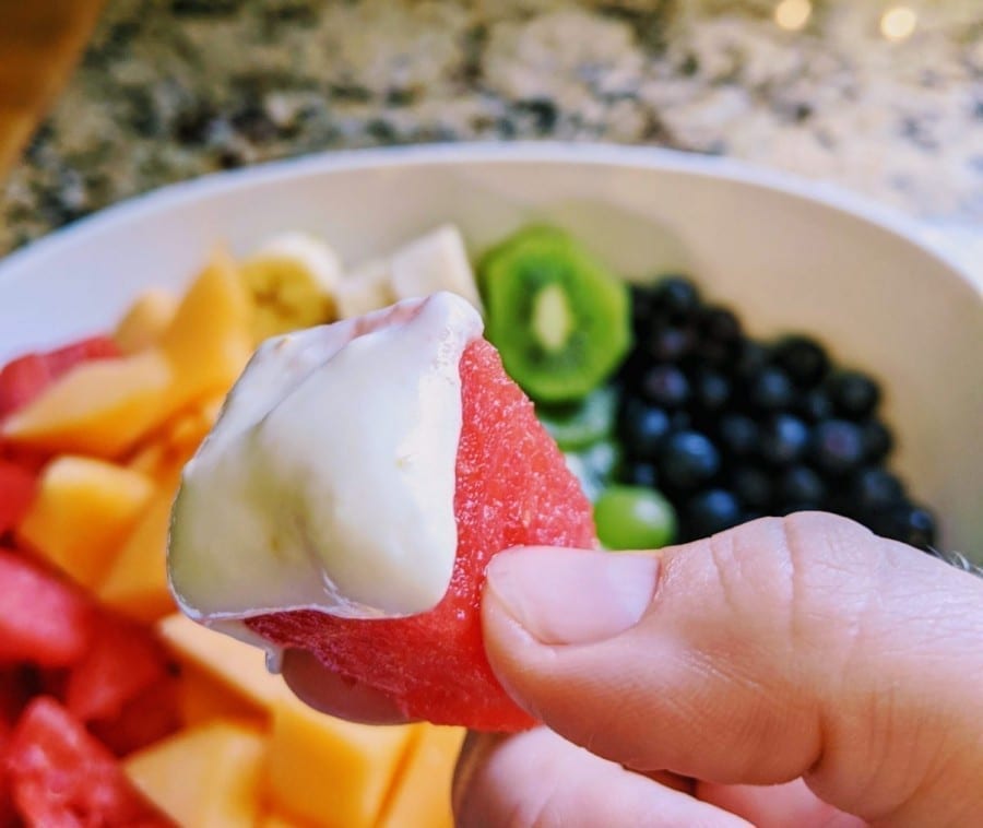 watermelon with fruit dip on it