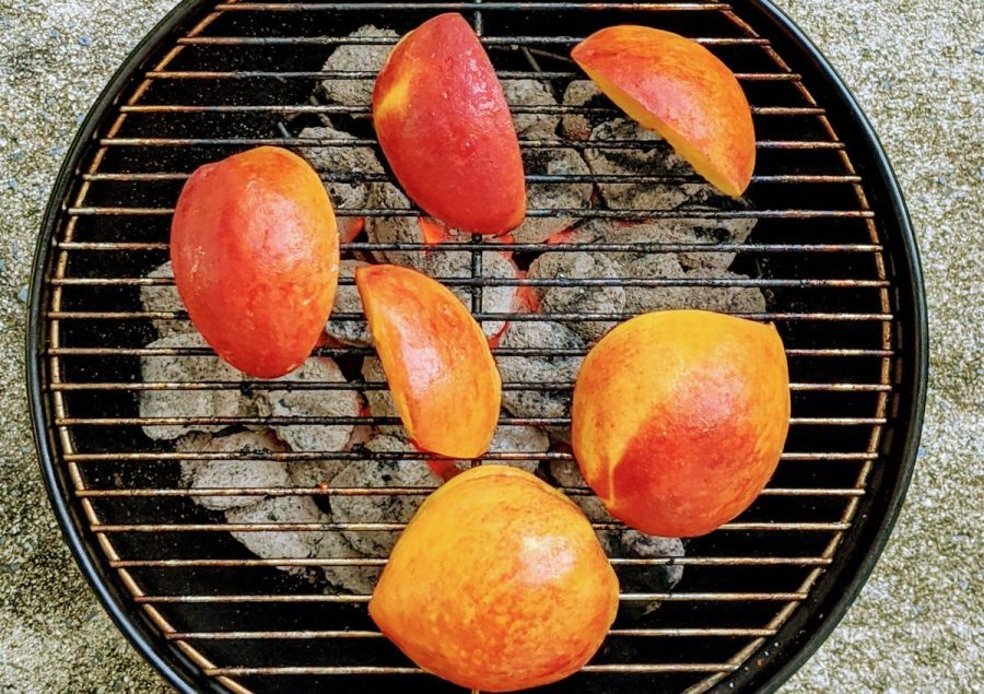 birds eye view of peaches on grill