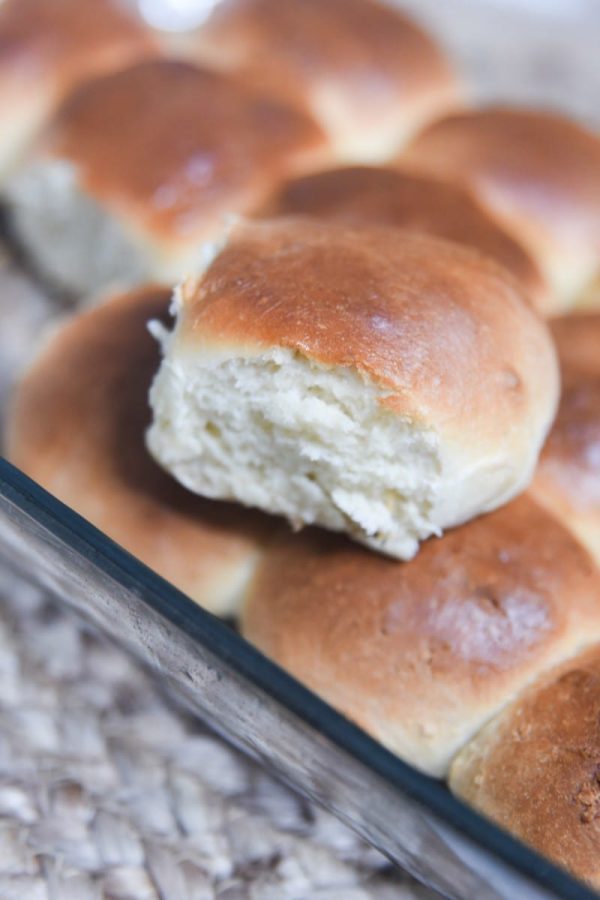 yeast dinner roll sitting on other rolls