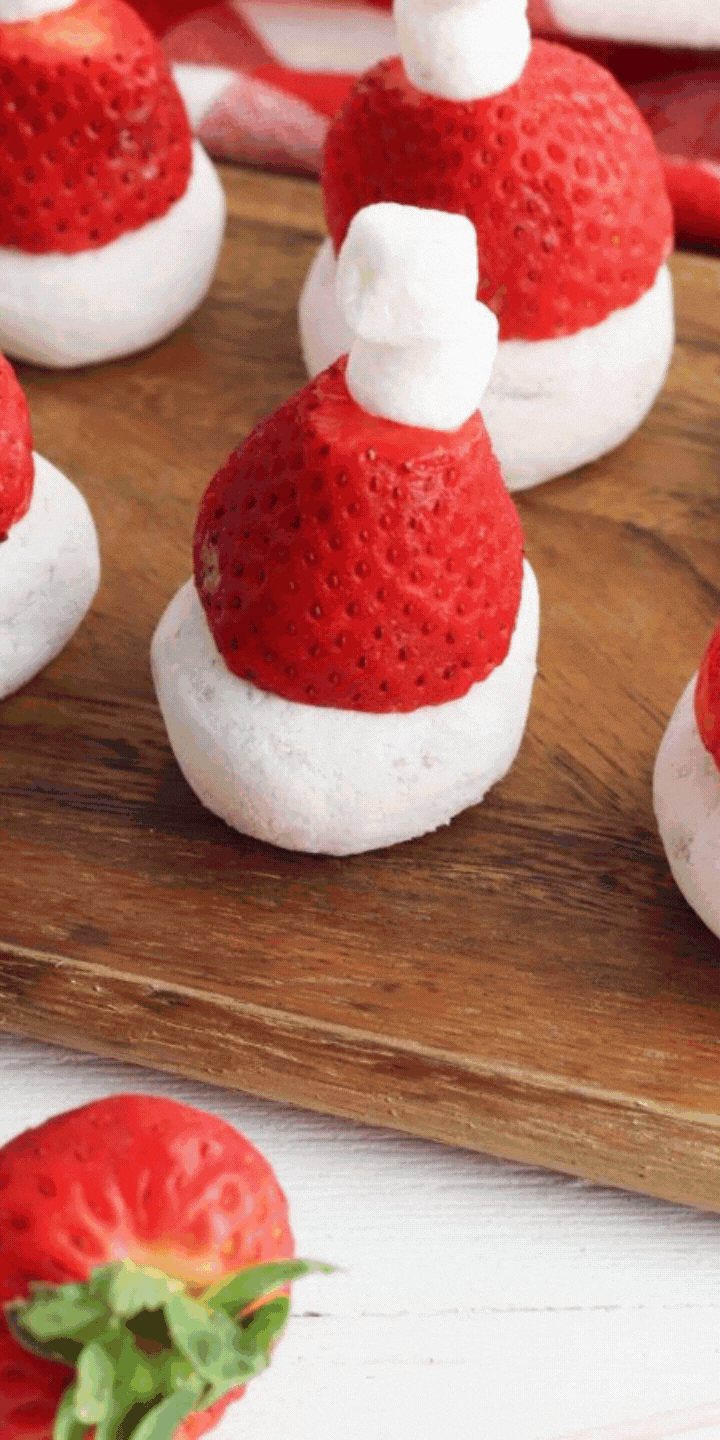 Nothing beats the smells and tastes of holiday treats in December. This fun Christmas dessert for kids is a festive way to spend the holiday season. Try these Santa Hat Donuts! via @simplysidedishes89