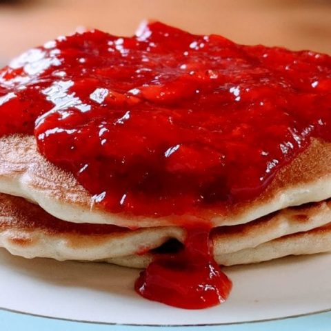 strawberry syrup on pancakes