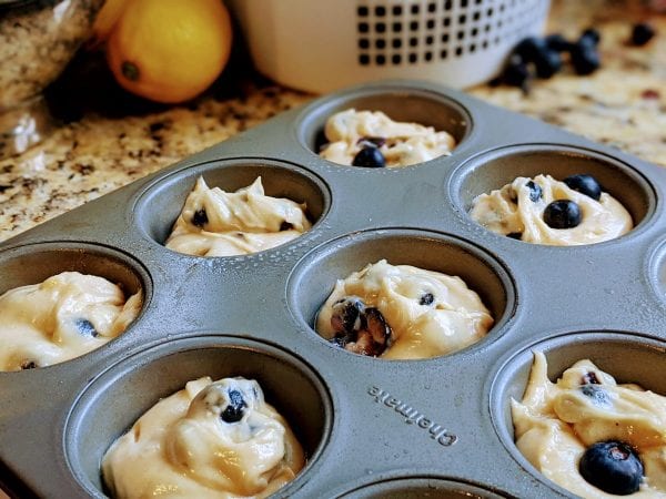 blueberry muffins in muffin pan