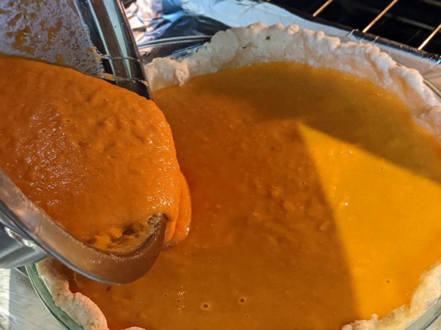 pouring sweet potato batter