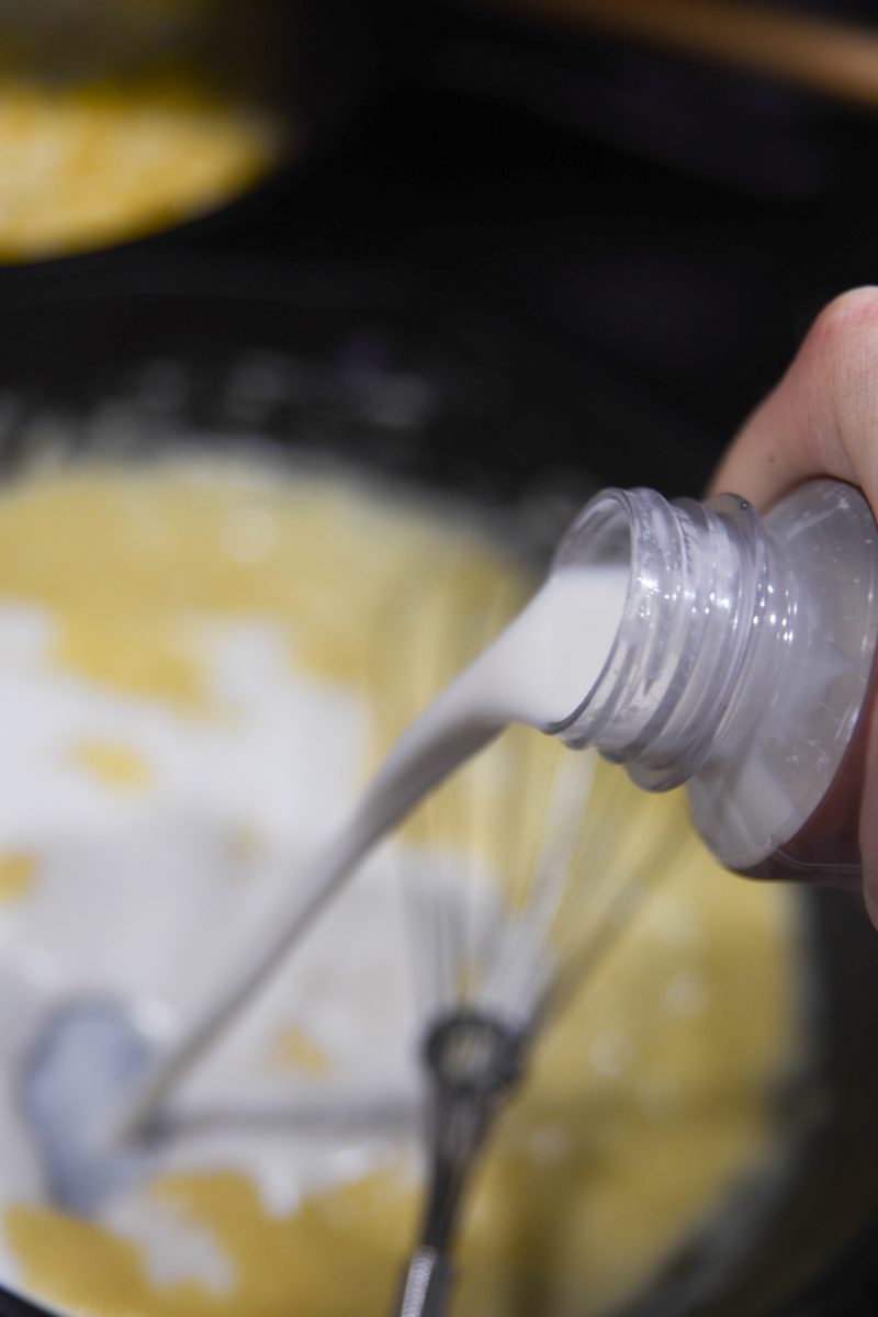 pouring cream into pan